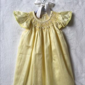 SOLD Vintage style pastel yellow smocked dress